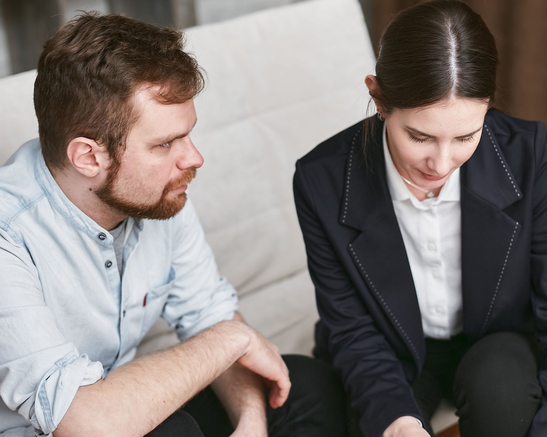 A professional talking through a document with a family member